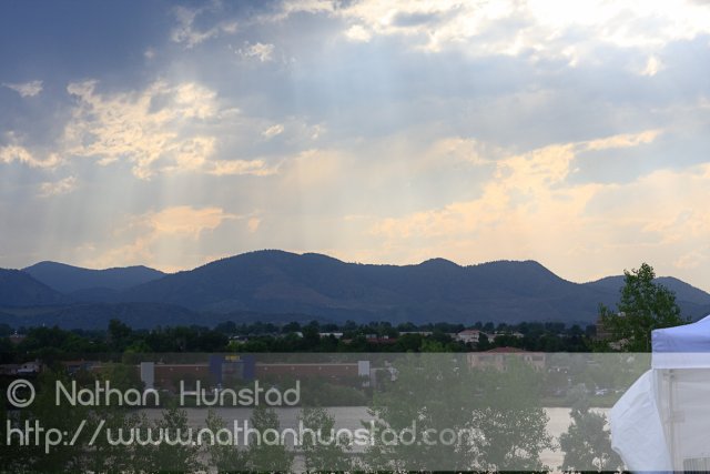 Sunlight streams through the clouds at the Colorado Irish Festival